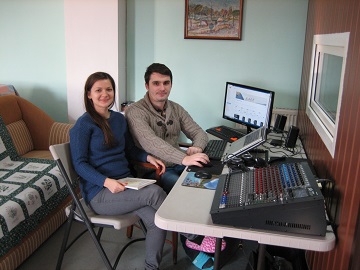 Silviu and Laura at work in the radio room